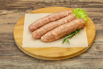 Raw pork meat sausages for grill