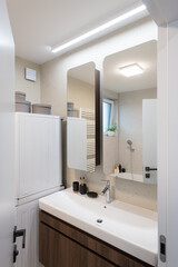 Detail of sink in contemporary bathroom