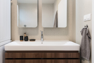 Detail of sink in contemporary bathroom