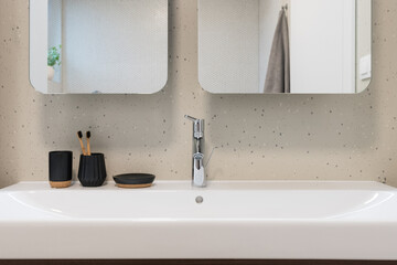 Detail of sink in contemporary bathroom