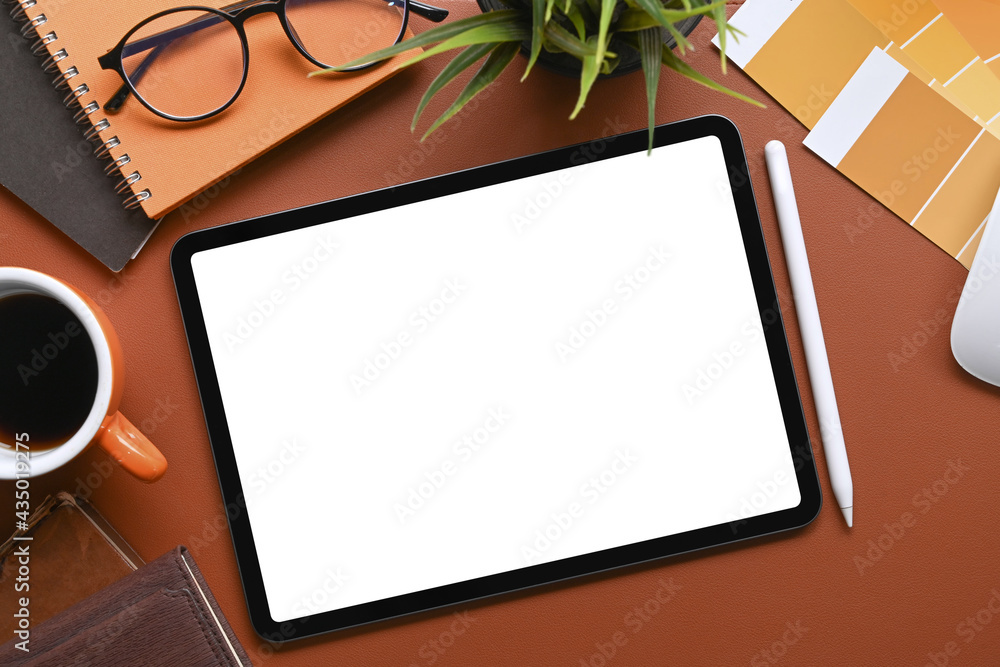 Poster top view of mock up digital tablet with empty screen on graphic designer workspace.