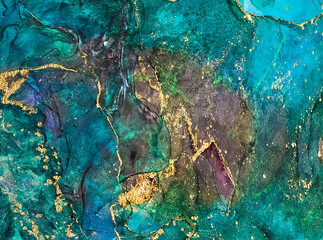 Ink, paint, abstract. Multicolor and gold abstract painting background. Alcohol ink modern abstract painting. Imitation marble.