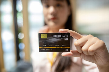 close up of woman hand holding credit card