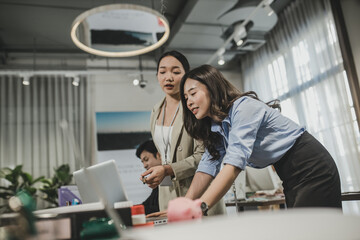 Women asian working together, at office . Businesswomen Having Informal Meeting In Modern Office