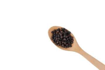 Black pepper on wooden spoon with clipping path.