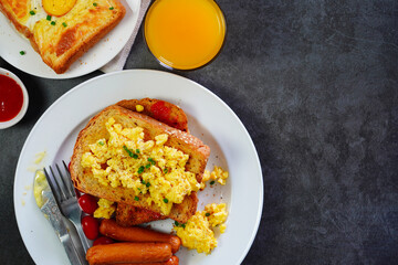 Homemade Breakfast With fried egg, bacon, toast and juice