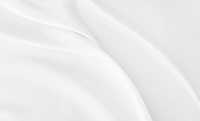 White gray satin texture that is white silver fabric silk background with beautiful soft blur...