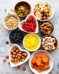 Bowls with various dried fruits and nuts