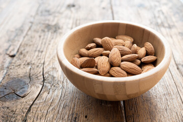 Almonds on the wooden table