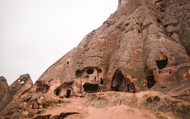 The ancient Selime Monastery (built into rocks) in Cappadocia, Turkey on a moody day