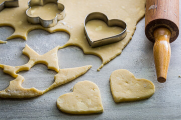 Cutting dough for milky biscuits. Preparation of butter biscuits.