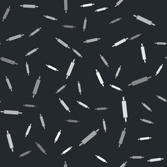 Grey Rolling pin icon isolated seamless pattern on black background. Vector