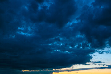 Dark blue clouds before storm . Spectacular heaven with twilight