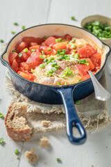 Shakshuka servred for breakfast. Tunisian cuisine for breakfast.