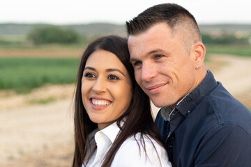 portrait of couple in love in the field