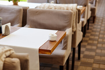 Restaurant or cafe with cozy interior. View of modern dinning room interior