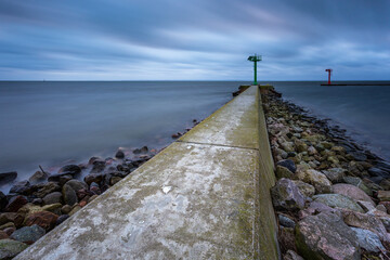 Breakwater covered with lighthouse, Jastarnia, Baltic Sea, Poland.
