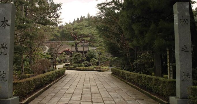 Push Through Japanese Pillars into Garden with Sculpted Trees Koyasan Japan 4K HD
