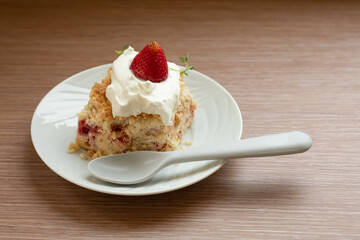 Strawberry crumble cake. Crumb cake as know as Streuselkuchen, is a cake made of yeast dough covered with a sweet crumb topping referred to as streusel.