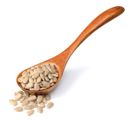 sunflower seeds in the wooden spoon, isolated on whtie background
