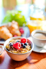 Breakfast served with coffee, orange juice, croissants, cereals