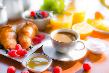 Breakfast served with coffee, orange juice, croissants, cereals