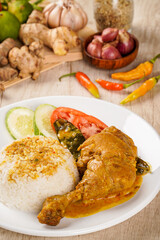 Indonesian Traditional cuisine : Ayam Gulai with rice. Ayam Gulai is a popular dish of chicken curry from Padang, West Sumatra 