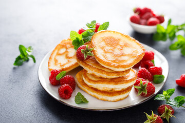 Breakfast pancakes with fresh raspberry