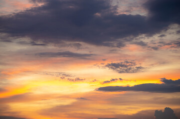 Naklejka na ściany i meble Gradient colorful cloudy sky at sunset.
