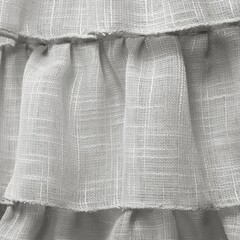 Close up of curtain fabric texture with ruffles in grey