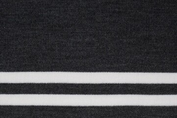 Dark grey striped rib knit fabric texture
