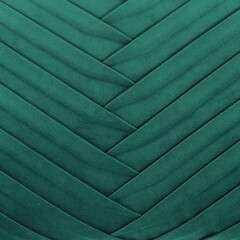 Pleated velvet fabric texture in emerald green color