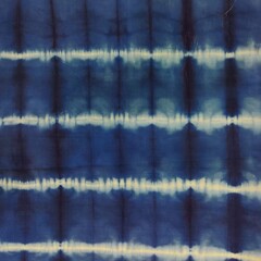 Shibori Tie Dye patterned cotton fabric texture in navy