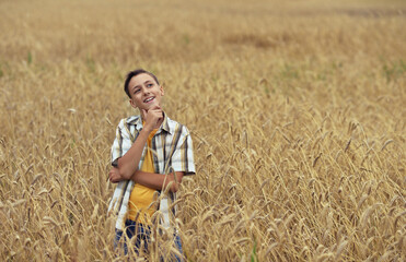 happy Boy in field enjoying nature