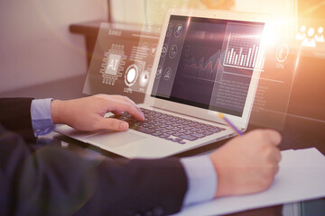 Business people using computer laptop HUD screen display projection, reading charts graphs statistics analyzing data gathering information technology business design idea planning, work desk station