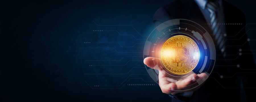 Hand holding digital bitcoin crypto currency for investment and value banking online technology