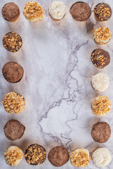 Brigadeiro is a common Brazilian dessert. Delicious chocolate candy Brigadeiro on a table