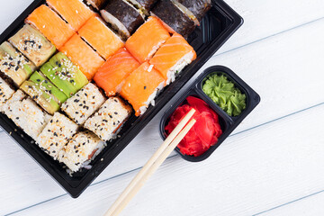 Sushi rolls in box. Set of sushi