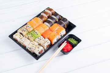 Sushi rolls in box. Set of sushi