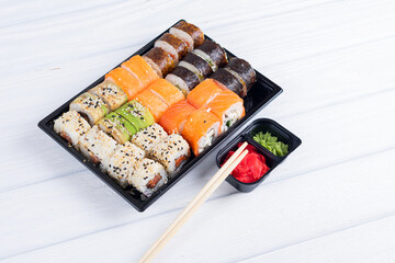 Sushi rolls in box. Set of sushi