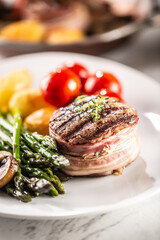 Grilled steak served on a plate with vegetables