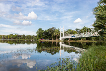 NAKHON RATCHASIMA, THAILAND - MARCH 17, 2020: The white bridge at Bung Ta Lua Water Park in Nakhon Ratchasima, Thailand