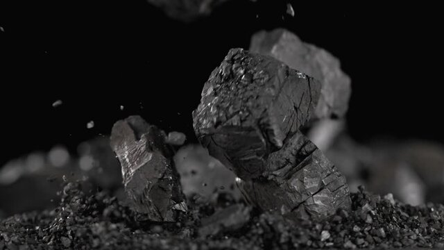 Super Slow Motion Shot of Falling Coal Lump at 1000 fps.