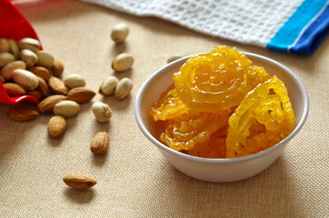 photo of Jalebi or Jilbi or imarati, indian sweet food fried in pure ghee.