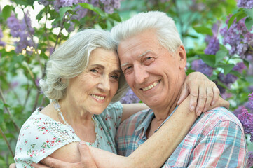 portrait of beautiful senior couple hugging
