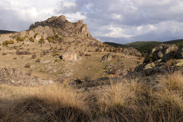 rocky peak and dramatic sky scenery
