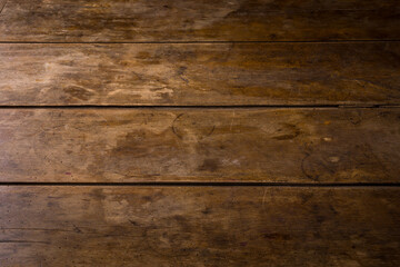 Naklejka premium old wooden table top background with wear marks