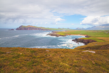 Scenic coastal seascape and landscape view from Ceann Sreatha on Waymont headland of Clogher Strand bay beach on the Dingle Peninsula, Ireland.