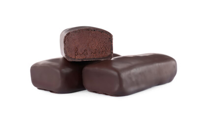 Delicious glazed cut and whole cheeses with cocoa on white background