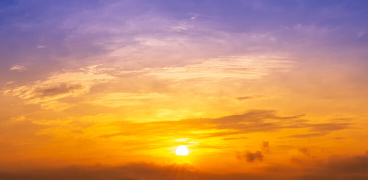 The golden sunrise and dramatic clouds, nature background © c_atta